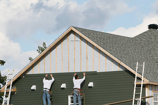 Professional Siding Contractor technician working in Holliston, MA